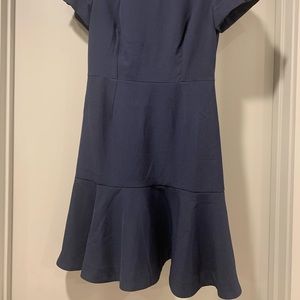 Navy dress with a lot of structure